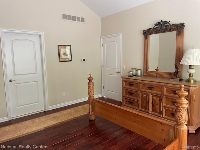 2750 Castlemartin Ct, Oakland, MI 48306 - bedroom with dark wood-style flooring, vaulted ceiling, and baseboards