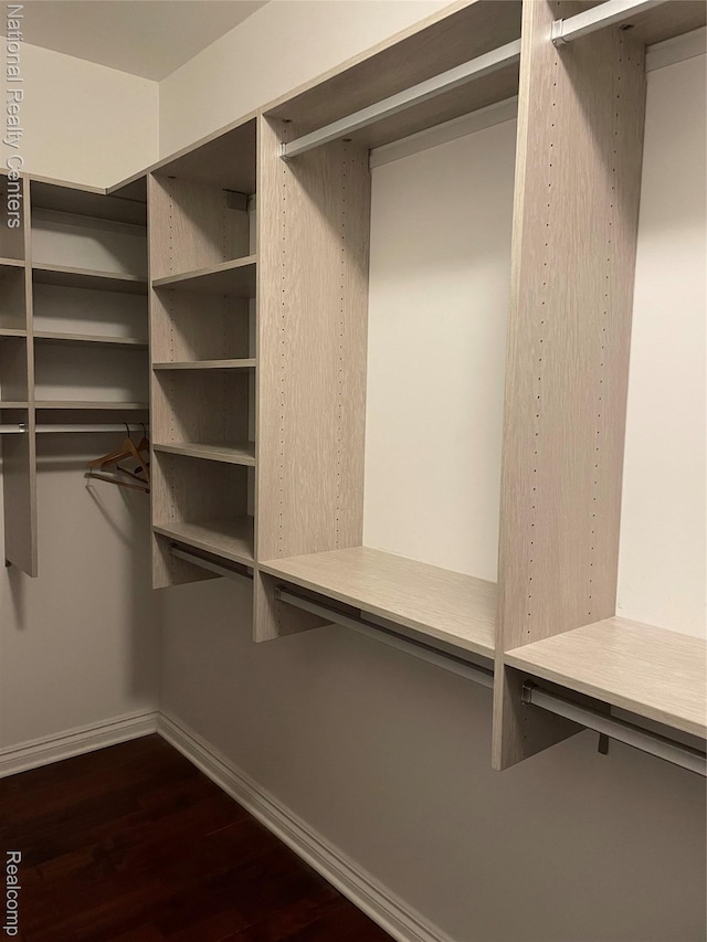 2750 Castlemartin Ct, Oakland, MI 48306 - spacious closet with dark wood finished floors