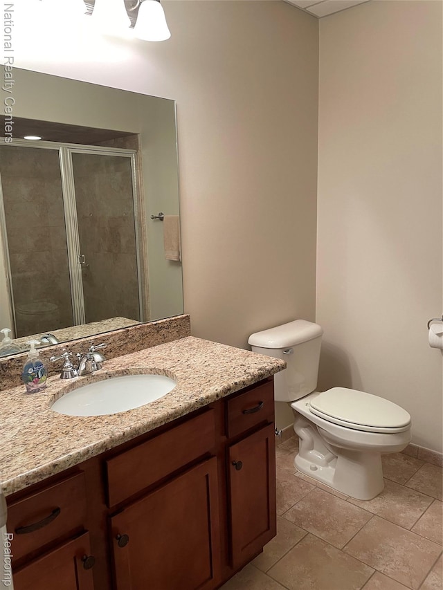 2750 Castlemartin Ct, Oakland, MI 48306 - bathroom with vanity, toilet, a stall shower, baseboards, and tile patterned flooring