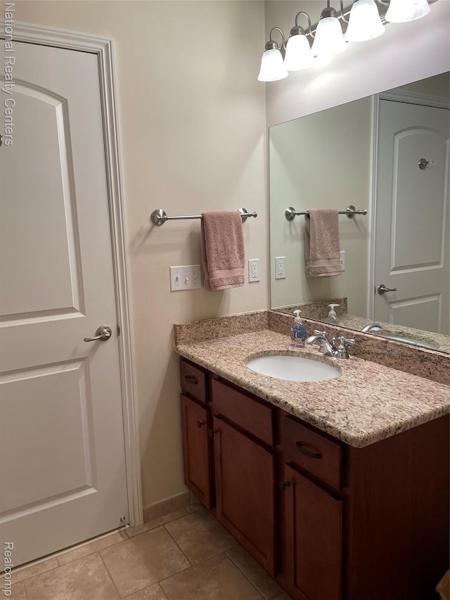 2750 Castlemartin Ct, Oakland, MI 48306 - bathroom featuring vanity and baseboards