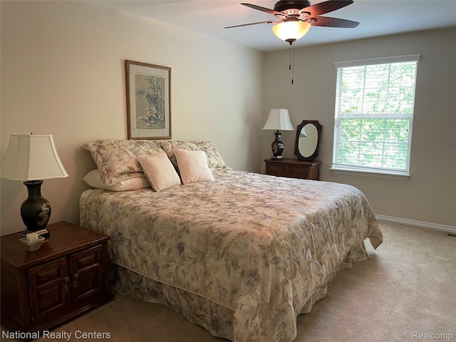 2750 Castlemartin Ct, Oakland, MI 48306 - bedroom with light colored carpet, baseboards, and a ceiling fan