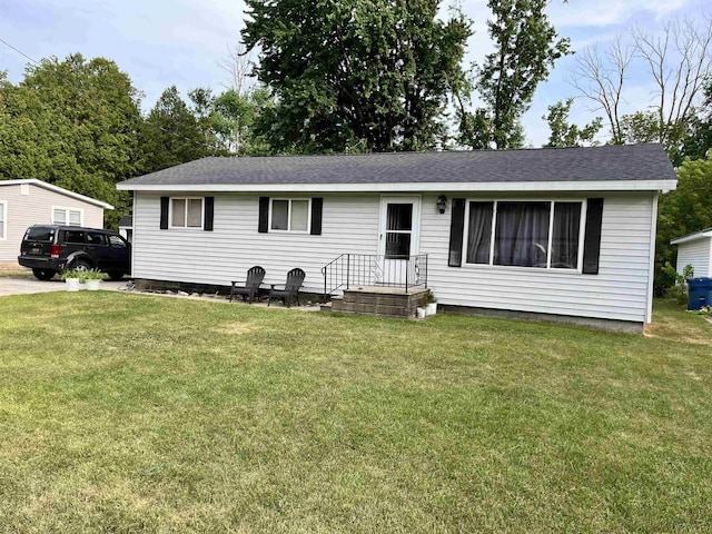 318 E N St, Standish, MI 48658 - ranch-style home featuring a front yard