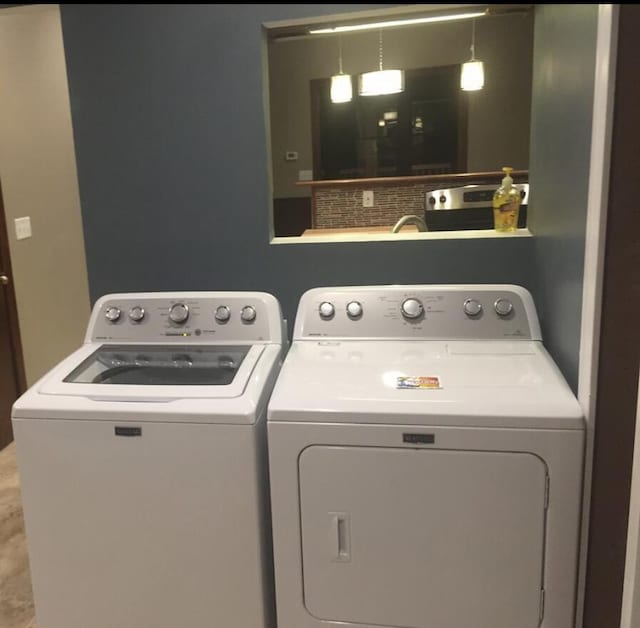 1116 Covell Ave NW, Grand Rapids, MI 49504 - washroom with washer and dryer
