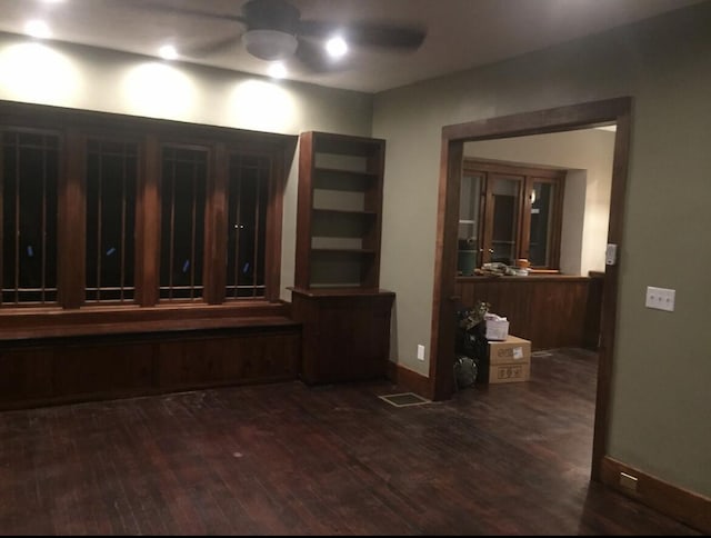1116 Covell Ave NW, Grand Rapids, MI 49504 - unfurnished dining area with wood finished floors, baseboards, and a ceiling fan