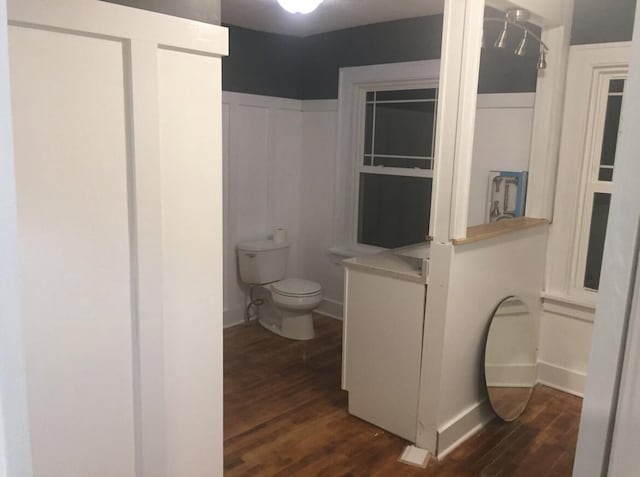 1116 Covell Ave NW, Grand Rapids, MI 49504 - bathroom with wood finished floors and toilet