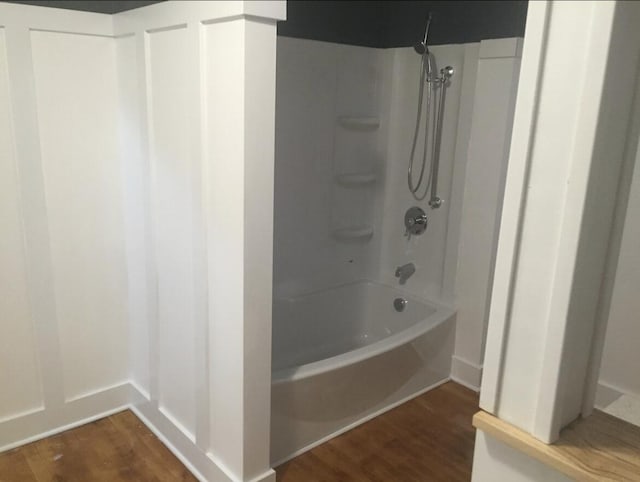 1116 Covell Ave NW, Grand Rapids, MI 49504 - full bathroom featuring wood finished floors and  shower combination