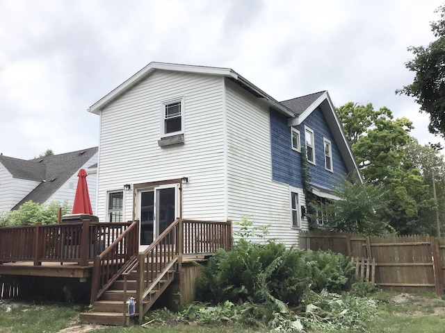 1116 Covell Ave NW, Grand Rapids, MI 49504 - rear view of house with a wooden deck
