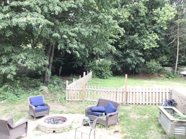 1116 Covell Ave NW, Grand Rapids, MI 49504 - view of yard with a fire pit and a patio area