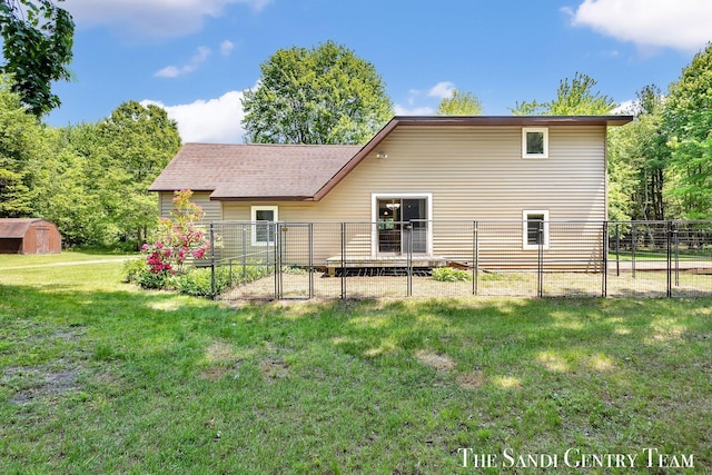 7120 Quarterline Rd, Spring Lake, MI 49456 - back of house featuring a gate and roof with shingles