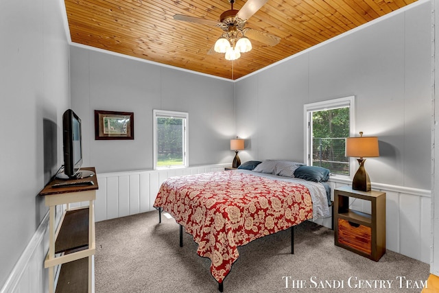 7120 Quarterline Rd, Spring Lake, MI 49456 - bedroom featuring a decorative wall, ornamental molding, carpet floors, wood ceiling, and wainscoting