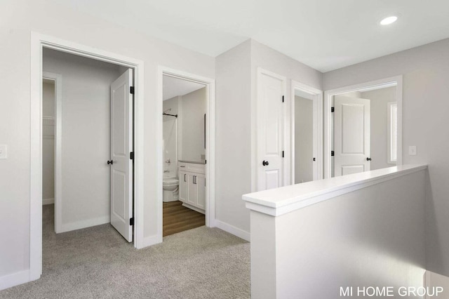 13654 Signature Dr, Holland, MI 49424 - corridor with carpet flooring, baseboards, and recessed lighting