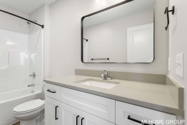 13654 Signature Dr, Holland, MI 49424 - bathroom featuring toilet, vanity, and washtub / shower combination