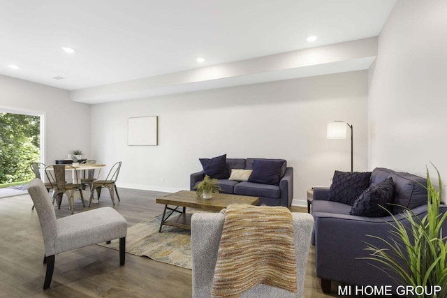13654 Signature Dr, Holland, MI 49424 - living area featuring wood finished floors, recessed lighting, and baseboards