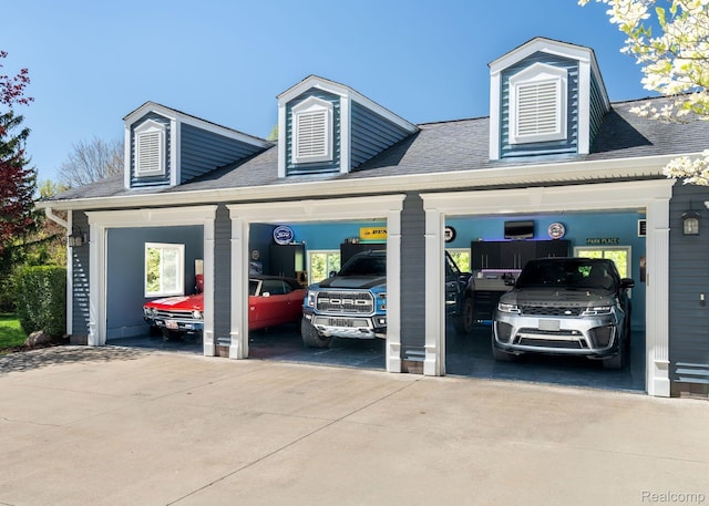 900 Indianwood Rd, Lake Orion, MI 48362 - view of vehicle parking featuring concrete driveway