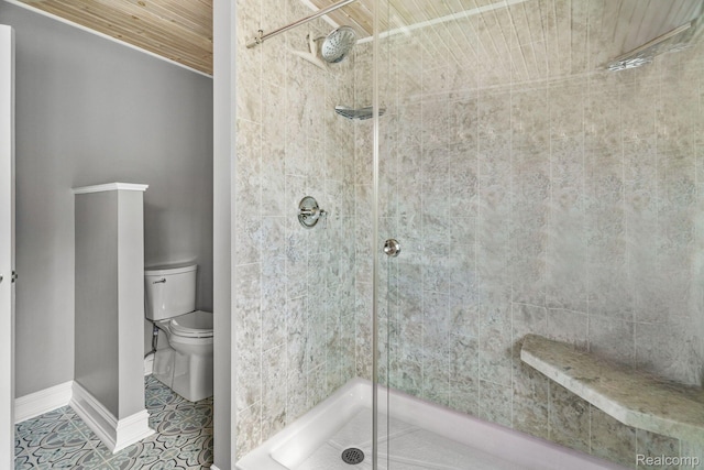900 Indianwood Rd, Lake Orion, MI 48362 - bathroom with a stall shower, wooden ceiling, toilet, and baseboards