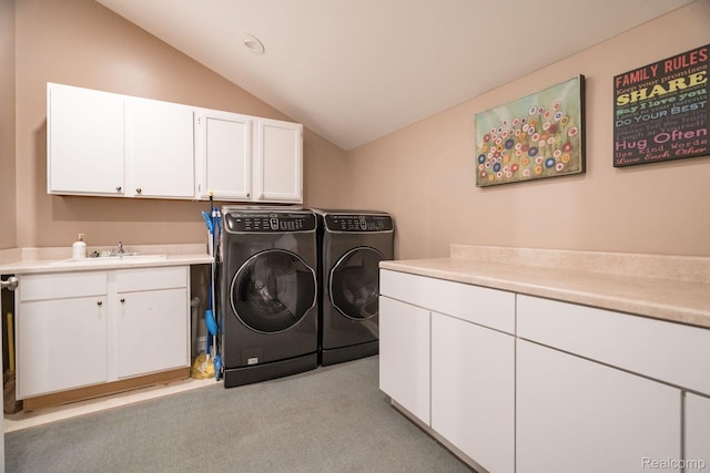 900 Indianwood Rd, Lake Orion, MI 48362 - washroom with washing machine and dryer, cabinet space, and light colored carpet