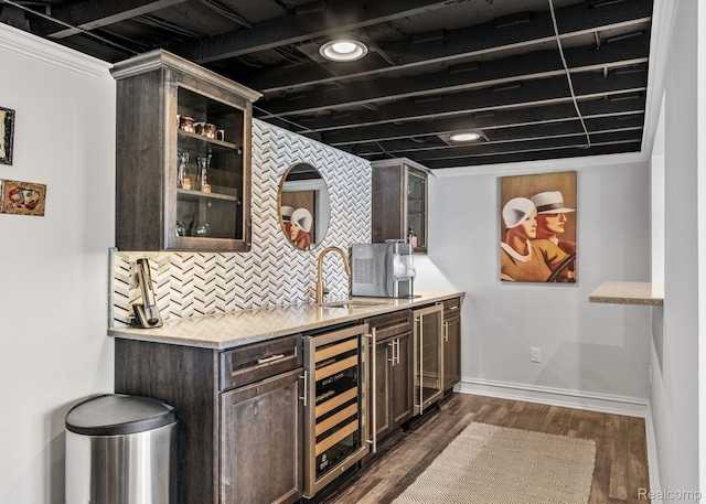 900 Indianwood Rd, Lake Orion, MI 48362 - indoor bar featuring beverage cooler, decorative backsplash, baseboards, and dark wood finished floors
