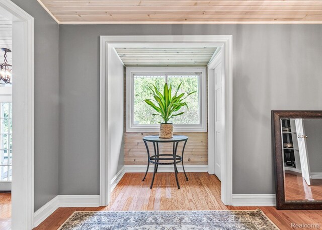 900 Indianwood Rd, Lake Orion, MI 48362 - detailed view of baseboards and wood finished floors