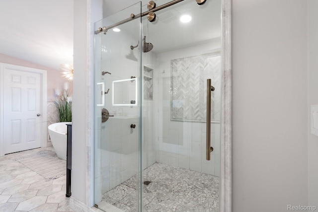 900 Indianwood Rd, Lake Orion, MI 48362 - full bath featuring a stall shower, a freestanding bath, and recessed lighting