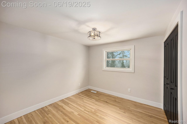 54232 Mound Rd, Shelby Twp, MI 48316 - empty room featuring light wood-style floors