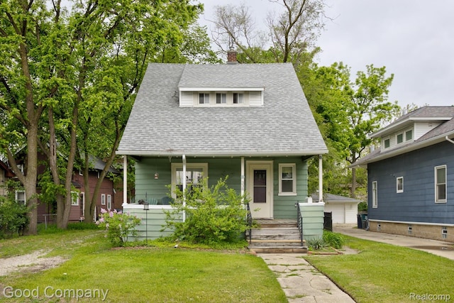338 W Parent Ave, Royal Oak, MI 48067 - bungalow with a porch, a shingled roof, a front lawn, an outdoor structure, and a garage