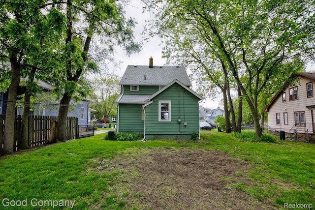 338 W Parent Ave, Royal Oak, MI 48067 - back of house with a chimney, a residential view, and a shingled roof