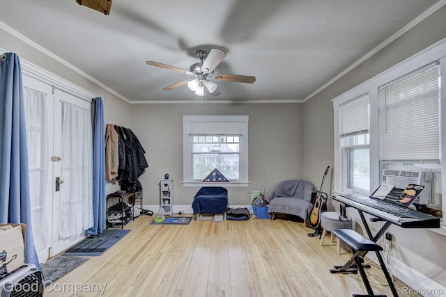 338 W Parent Ave, Royal Oak, MI 48067 - workout area with hardwood / wood-style floors, healthy amount of natural light, ceiling fan, ornamental molding, and cooling unit
