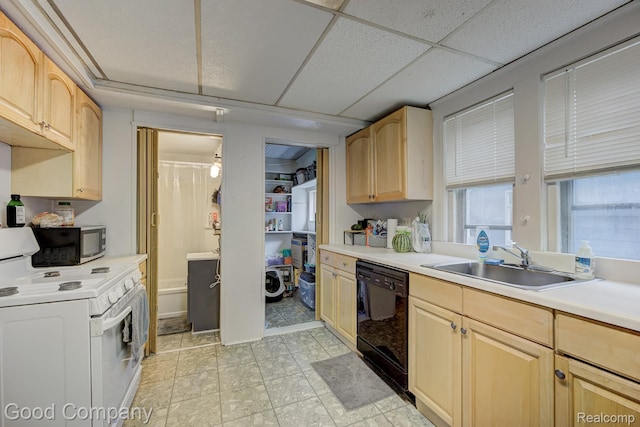 338 W Parent Ave, Royal Oak, MI 48067 - kitchen featuring black appliances, a sink, light brown cabinetry, light countertops, and a drop ceiling