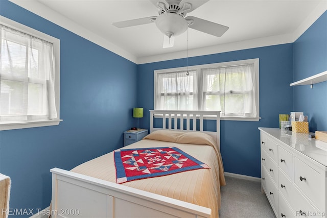 18155 Audette St, Dearborn, MI 48124 - bedroom with light carpet, baseboards, and a ceiling fan