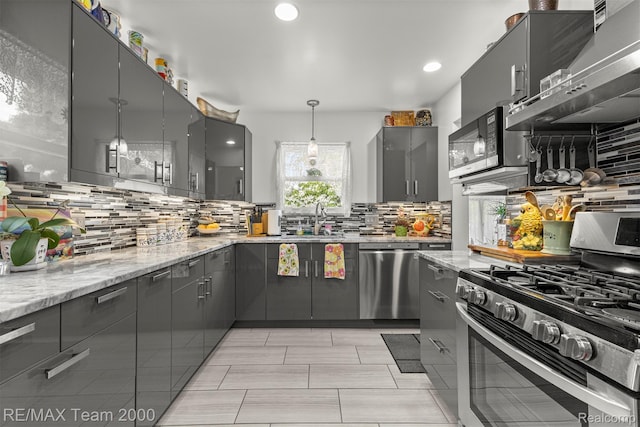 18155 Audette St, Dearborn, MI 48124 - kitchen with appliances with stainless steel finishes, gray cabinetry, a sink, backsplash, and light stone counters