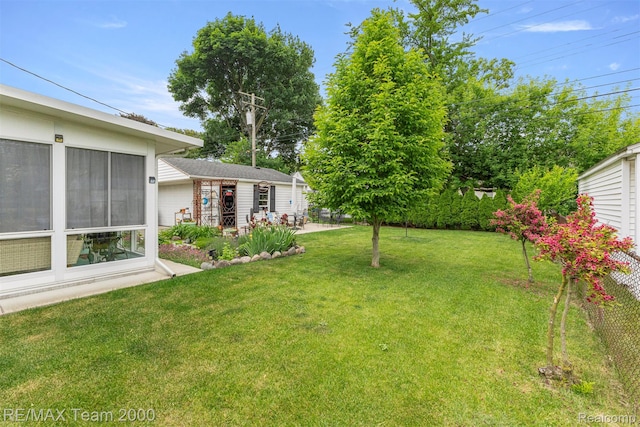 18155 Audette St, Dearborn, MI 48124 - view of green lawn featuring a patio area