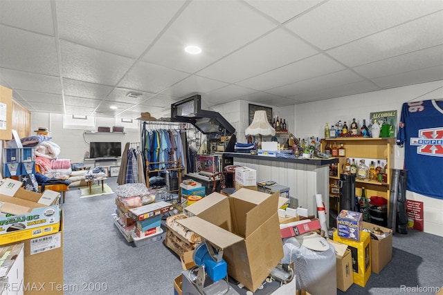 18155 Audette St, Dearborn, MI 48124 - misc room featuring a drop ceiling, concrete block wall, and carpet flooring