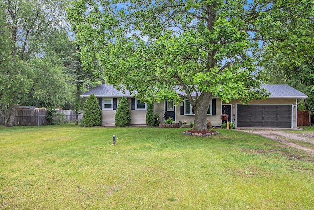 46915 Anthony St, Paw Paw, MI 49079 - obstructed view of property featuring driveway and an attached garage