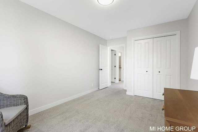 13652 Signature Dr, Holland, MI 49424 - carpeted bedroom featuring baseboards and a closet