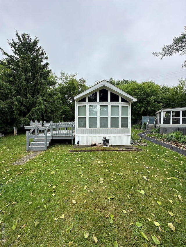 10001 Goodall Rd Unit 30, Durand, MI 48429 - view of side of home featuring a lawn