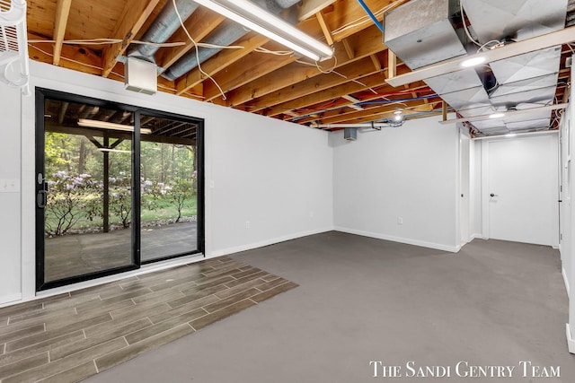 6372 Lake Harbor Rd, Norton Shores, MI 49441 - basement featuring baseboards