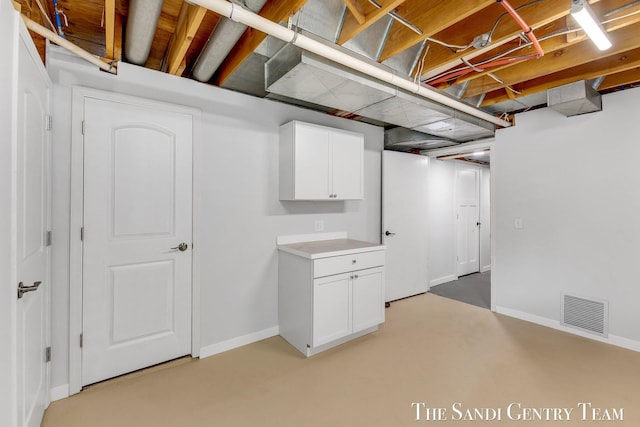 6372 Lake Harbor Rd, Norton Shores, MI 49441 - finished below grade area featuring baseboards