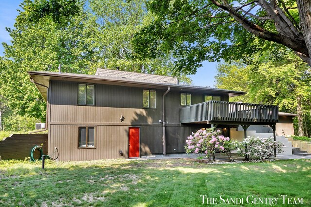 6372 Lake Harbor Rd, Norton Shores, MI 49441 - back of property featuring a yard