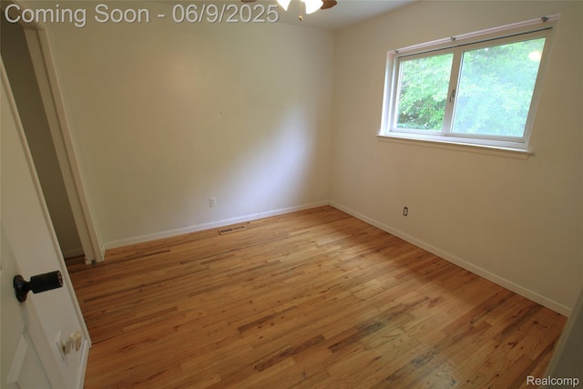 6325 Clarkston Rd, Clarkston, MI 48346 - spare room featuring light wood-type flooring, baseboards, and ceiling fan