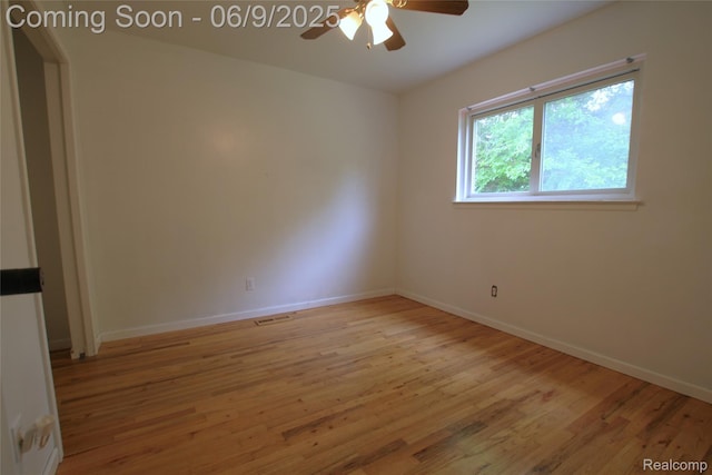 6325 Clarkston Rd, Clarkston, MI 48346 - empty room featuring light wood-style flooring, ceiling fan, and baseboards