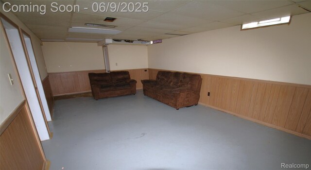 6325 Clarkston Rd, Clarkston, MI 48346 - finished basement with wooden walls, wainscoting, and a drop ceiling