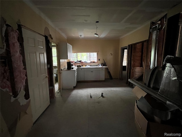 728 Lawrence St, Detroit, MI 48202 - kitchen with white cabinets and light countertops