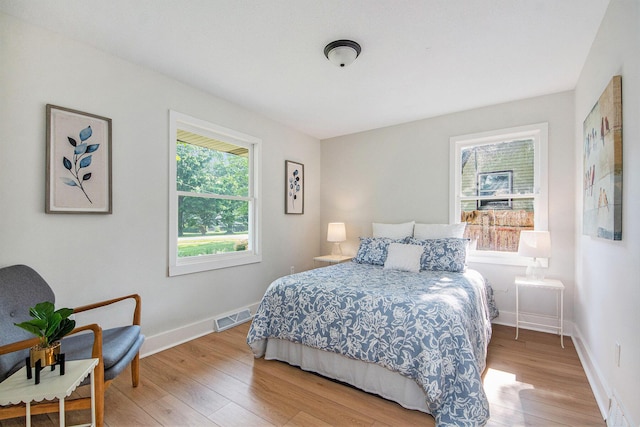 15878 New Holland St, Holland, MI 49424 - bedroom with wood finished floors and baseboards