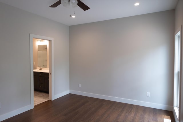 103 Diamond Point Ln, New Buffalo, MI 49117 - unfurnished bedroom featuring dark wood finished floors, baseboards, recessed lighting, ensuite bathroom, and ceiling fan