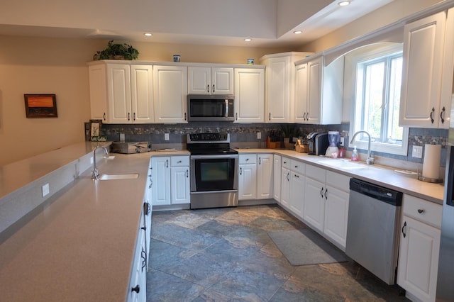103 Diamond Point Ln, New Buffalo, MI 49117 - kitchen with stainless steel appliances, a sink, recessed lighting, and tasteful backsplash