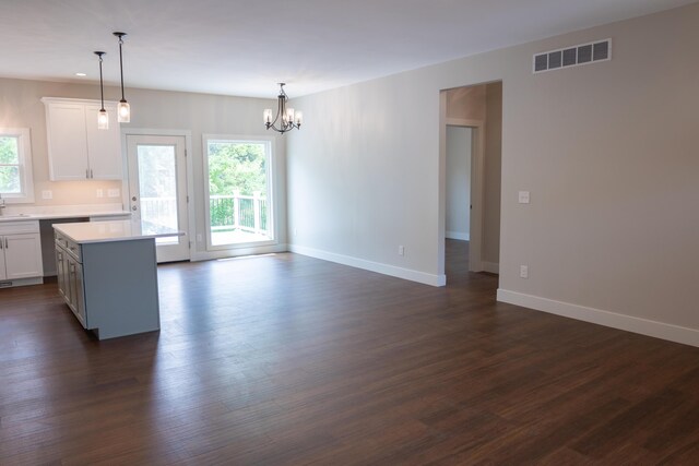103 Diamond Point Ln, New Buffalo, MI 49117 - kitchen with light countertops, dark wood-style floors, and white cabinets