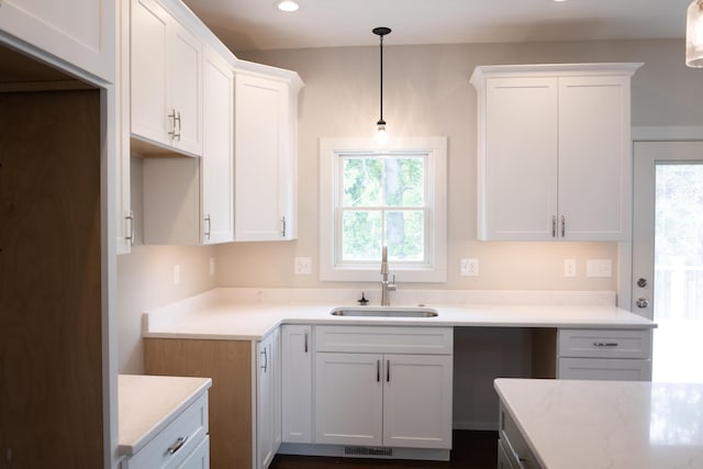 103 Diamond Point Ln, New Buffalo, MI 49117 - kitchen featuring a sink, healthy amount of natural light, white cabinetry, recessed lighting, and hanging light fixtures