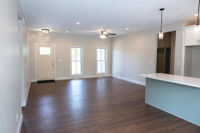 103 Diamond Point Ln, New Buffalo, MI 49117 - unfurnished living room featuring a ceiling fan, dark wood-type flooring, baseboards, and recessed lighting