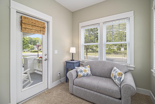 23 Kenneth St, Pentwater, MI 49449 - living area with carpet, healthy amount of natural light, and baseboards