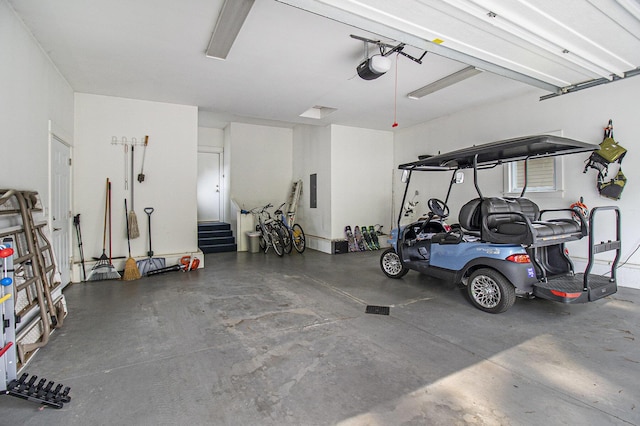 23 Kenneth St, Pentwater, MI 49449 - garage with a garage door opener